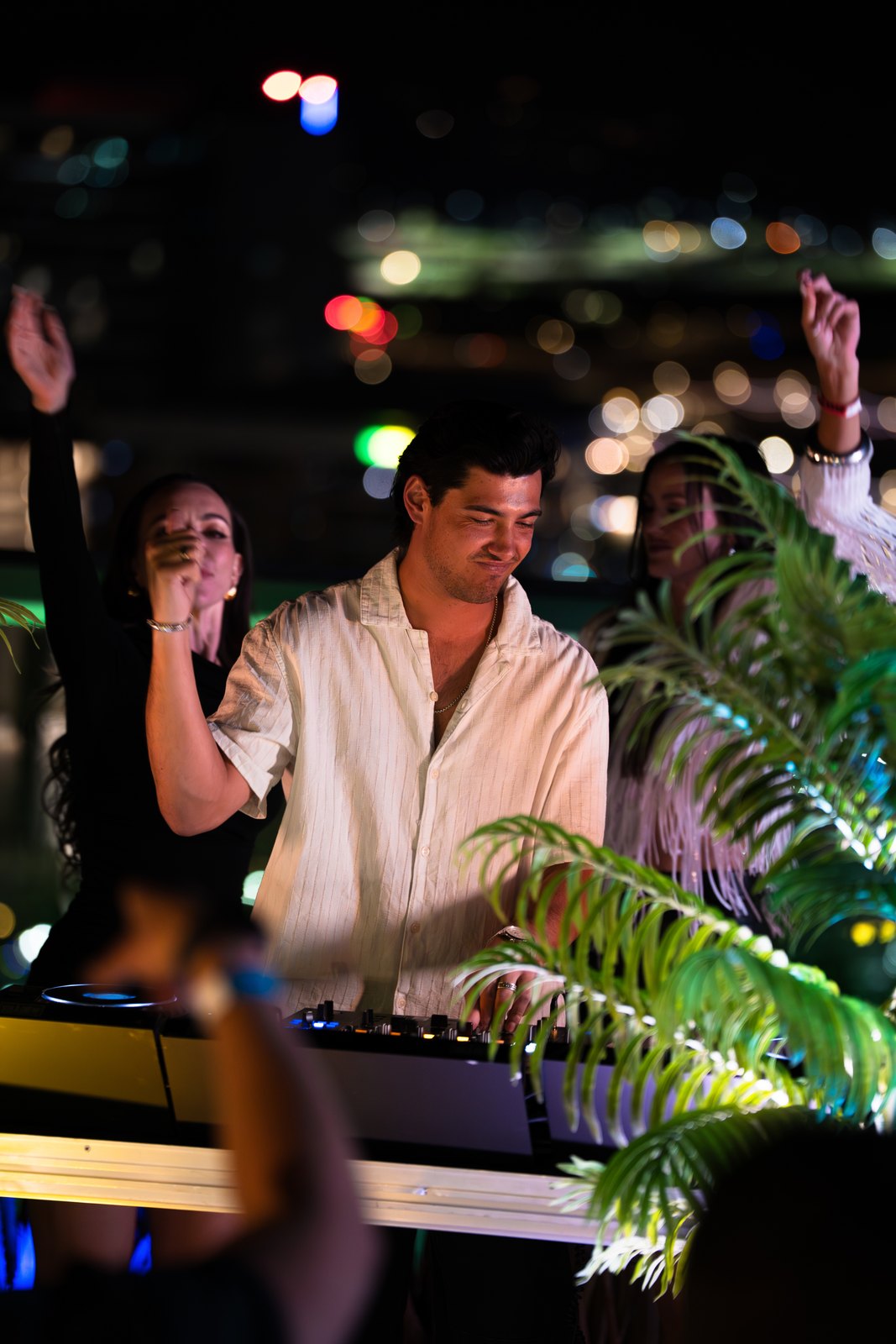 A DJ playing on the Skysill rooftop