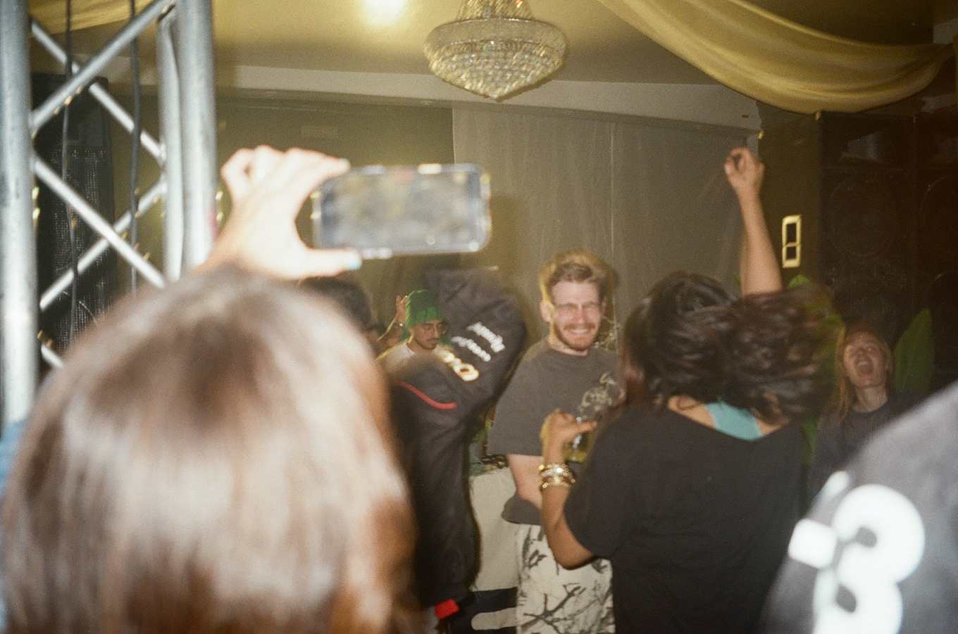Guests dancing with phones up